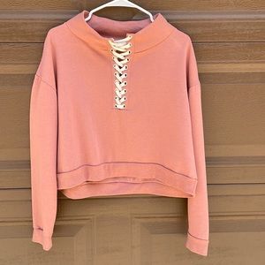 Cropped long sleeve top . Bought from Buckle